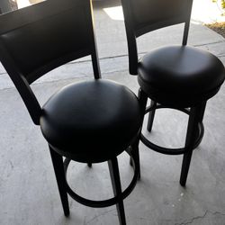 2 Leather Swivel Stools 