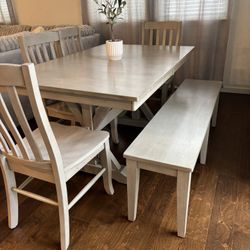 Grey table 4 Chairs 1 Bench 1 Year Old With 1 Flaw 350 OBO