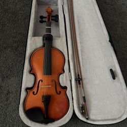 New Violin  W Case  $30 Obo 