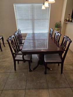 Dining table and six chairs.