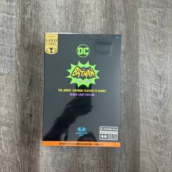 In Hand, Brand New, Never Opened - McFarlane - DC Retro - Batman 66 Classic TV Series - Joker - Black Light - Gold Label - 6” Inch Action Figure