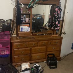  Brown wooden dresser with mirror