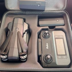 RUKO f11 Drone  3 Batteries & Case Never Flown 