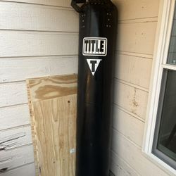 TITLE Boxing 100 lb Leather Thai Heavy Bag (retails $299.99 new)