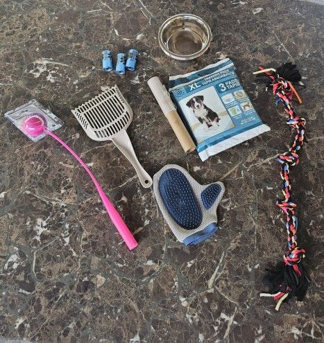 6 Dog bowls, toys and cleaning supplies