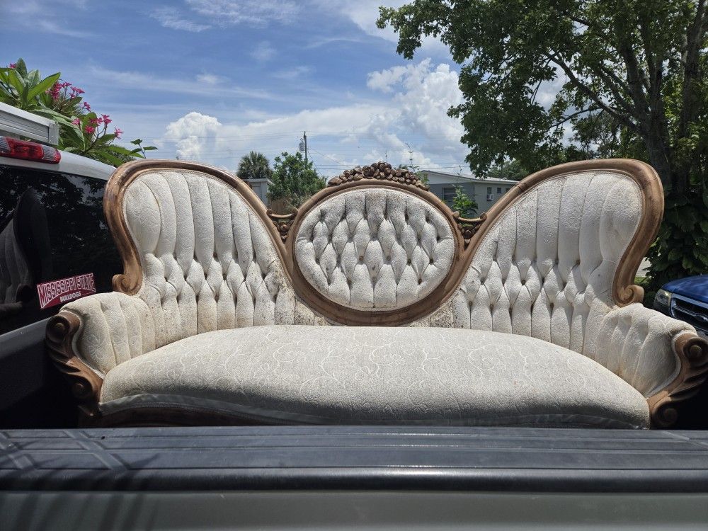 Antique couch. Needs Reupholstering/cleaning/sanded & stained
