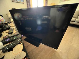 Large 60-inch Sharp AQUOS LED TV model LC-60LE633U.