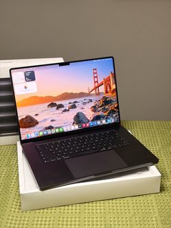 MacBook Pro 16” with M5 Max chip, 48GB RAM and 2TB SSD, in Space Black.