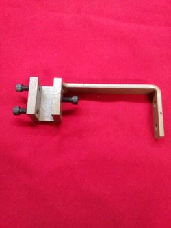 Sewing machine feed of arm