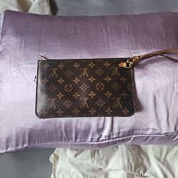  Louis Vuitton Wristlet - $350