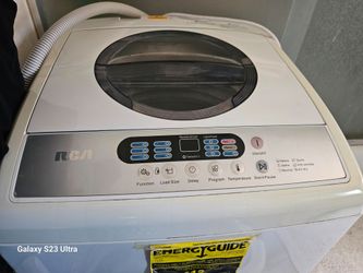 RCA washing machine  family size  working  grate H 35" x w 20" x D 21"