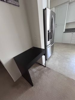 Small desk has one drawer