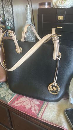 To the same Michael Kors like you never used different color purses $45 each