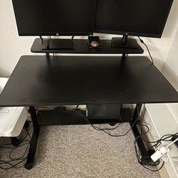 Adjustable sit stand desk with ergonomic chair