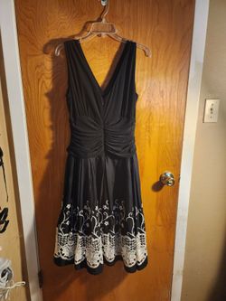 Black Sleeveless Dress with White Lace Hem