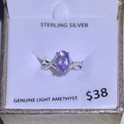  Oval Treated Amythyst and CZ Twist Ring in Sterling Silver