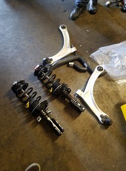 Strut Assembly. Control Arm. Brakes. Rotors