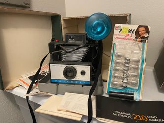 Vintage Polaroid 210 Land Camera with Flash, Bulbs, and original Booklet