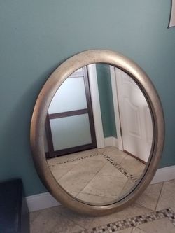 Oval mirrors, 39"x31", have several of these in silver tone and gold tone.