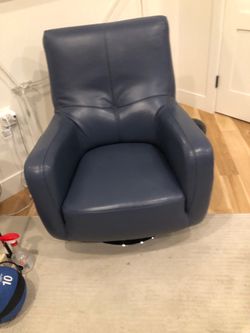 Matching Blue Leather Swivel Accent Chair