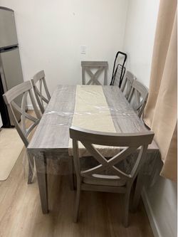 Dinner table with chairs