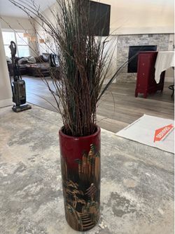 Large floor vase with decorative branches