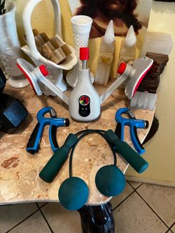 Thigh master, two grippers and pair of swinging balls