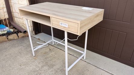 Brand NEW Desk! Never used. Built in with Outlets and USB ports.