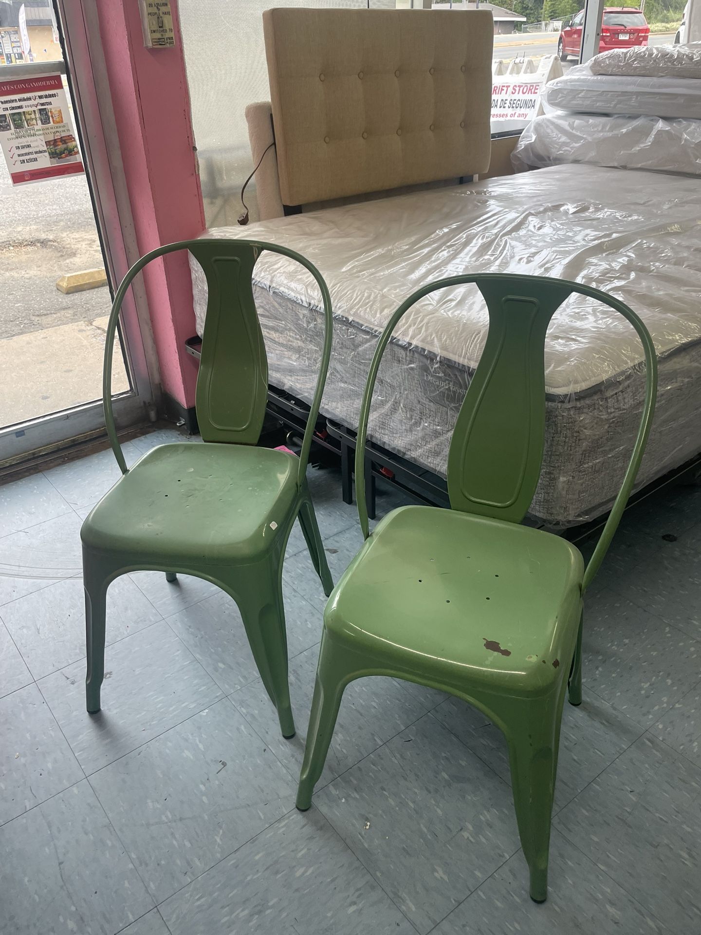 For sale: 2 metal stackable chairs by EMMA + OLIVER. commercial-grade and suitable for indoor-outdoor use. Painting required.  $20,for both.  