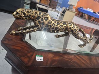 Figura de jaguar de fronce