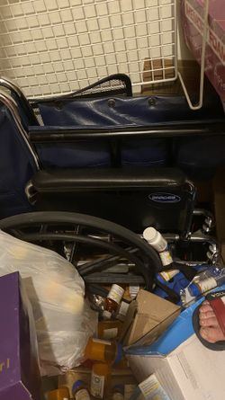Wheel chair with leg pieces.