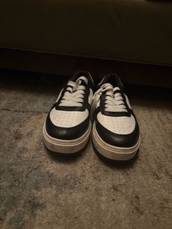 Black and white high toe sneakers