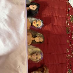 6 Barbies $18