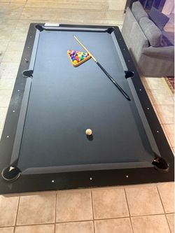 Gently used pool table