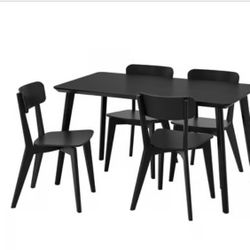 Black Table And Four Chairs