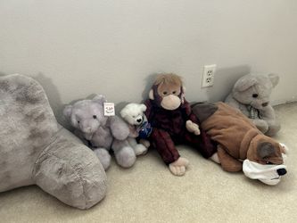 Beautiful Stuff Animals And Bed Rest Pillow