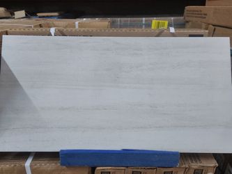 Floor Porcelain Tile 12x24.  .69 cents sqft  Box 17.60sqft $12.14