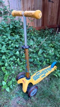Mini micro yellow scooter