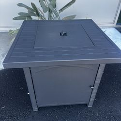 brand new patio fire pit in box