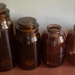 Set Of 4 Amber Color Vases-(2)-7” Tall—-8.5”—10.5”