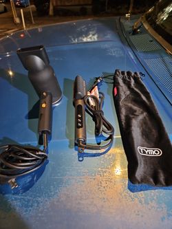 Hair straightener with hair dryer