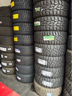 33X12.50R15 SET OF 4 MUD TIRES WITH INSTALLATION AND BALANCING