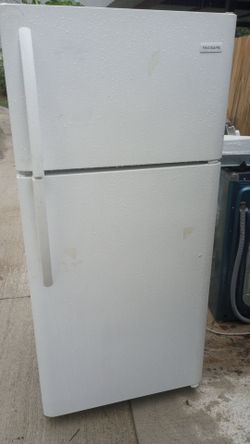 Frigidaire puerta arriva y abajo