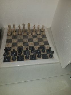 Used large  Coral Chess Set
