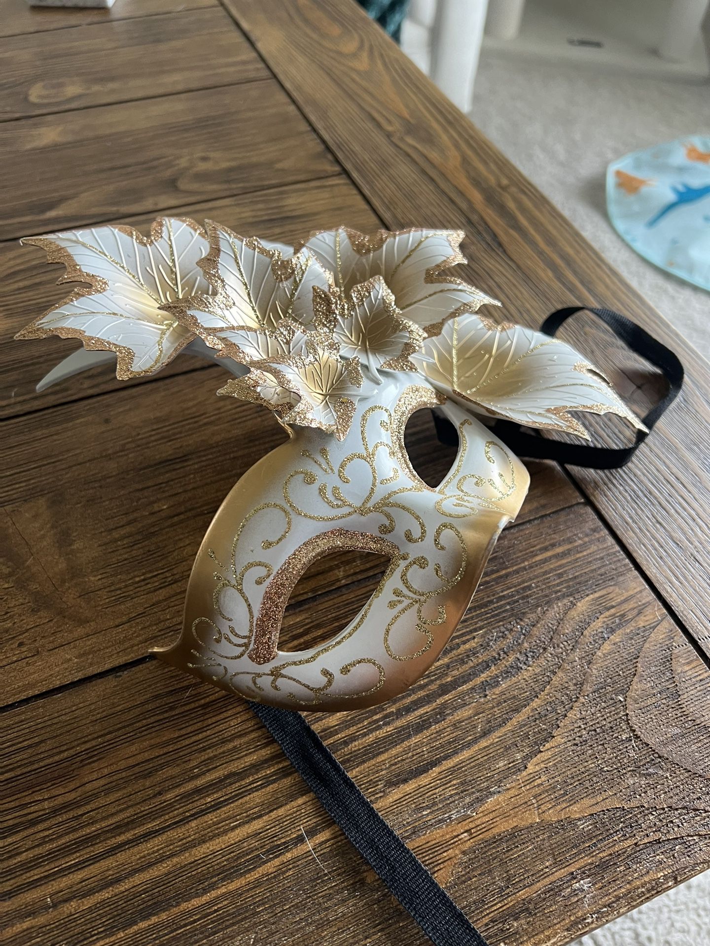Beautiful, white and gold Mardi Gras mask with beautiful, sparkling detail. Absolutely beautiful, but I just don’t have a need for it anymore. Only wo