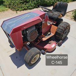 Wheelhorse Tractor with Attachments