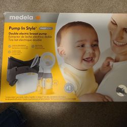Madela Pump With Milk Storage Bags Added