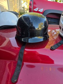 Size large German-style motorcycle half helmet in a gloss black finish.