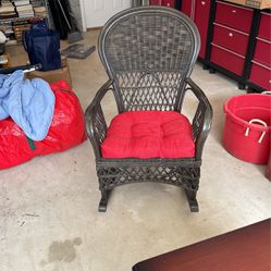 Black Wicker Rocking Chair With red Cushion