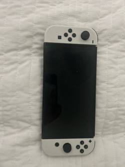 Nintendo Switch OLED White bundle with smash bros.